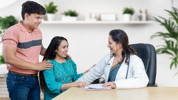 indian-female-gynecologist-doctor-consulting-young-married-couple-patients-in-fertility-clinic-about-224545137-16x9_0